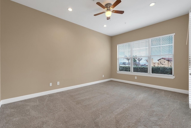 carpeted spare room with recessed lighting, a ceiling fan, lofted ceiling, and baseboards