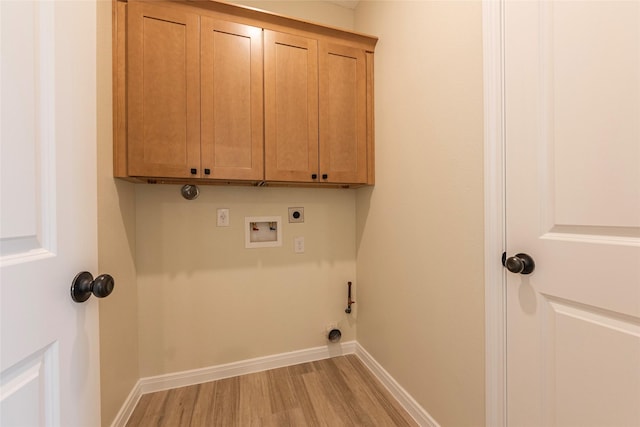 laundry area with electric dryer hookup, light wood-type flooring, cabinet space, baseboards, and hookup for a washing machine