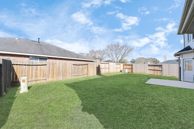 view of yard featuring a fenced backyard