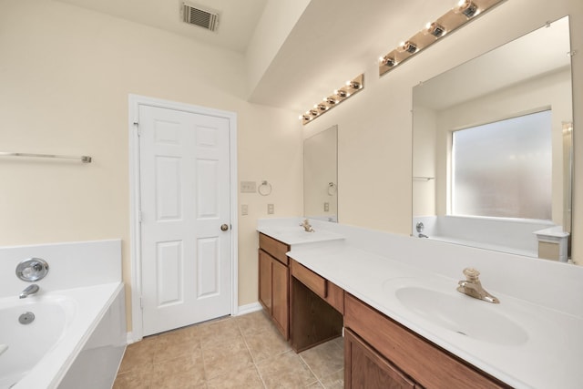 full bath featuring tile patterned floors, a bath, visible vents, and a sink