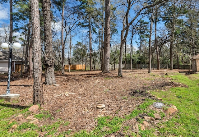 view of yard with fence