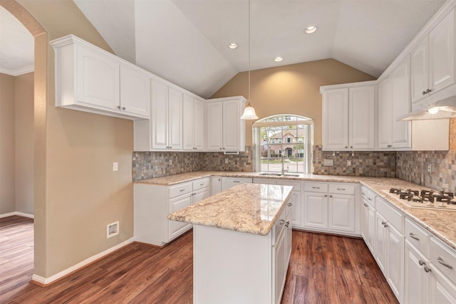 kitchen featuring dark wood-style floors, a sink, white cabinetry, and white gas cooktop