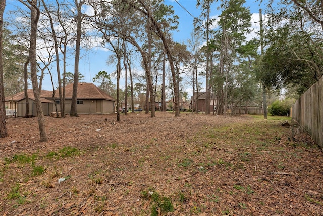 view of yard with fence