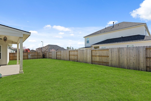 view of yard featuring a fenced backyard