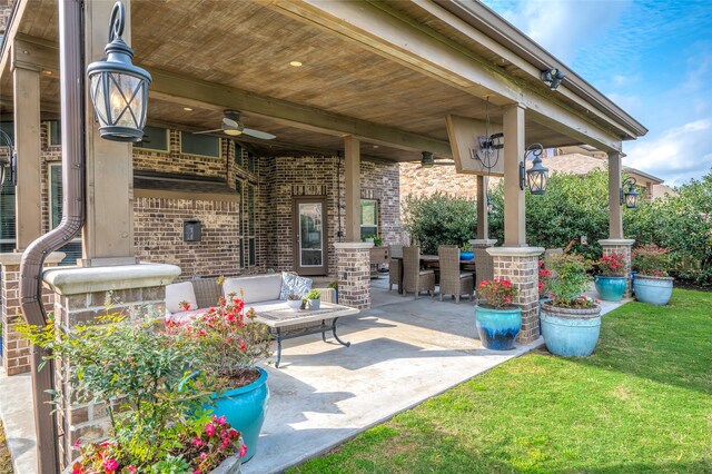 view of patio / terrace with an outdoor living space and a ceiling fan