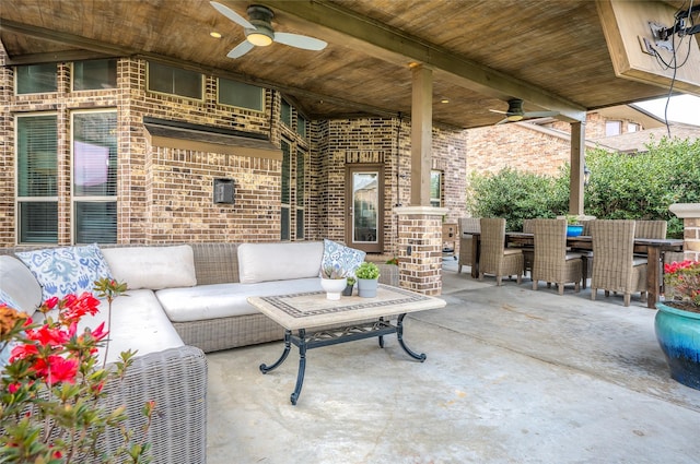 view of patio featuring an outdoor living space, outdoor dining area, and ceiling fan