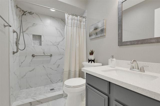 full bathroom with a stall shower, toilet, and vanity