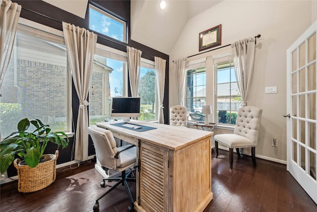 home office featuring dark wood-style flooring, baseboards, and vaulted ceiling