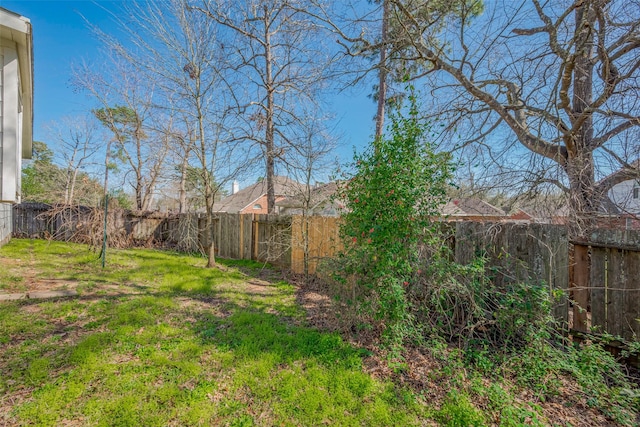 view of yard featuring a fenced backyard