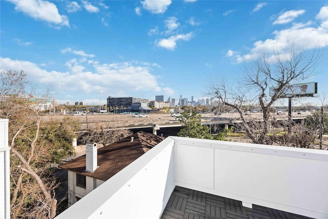 balcony featuring a city view