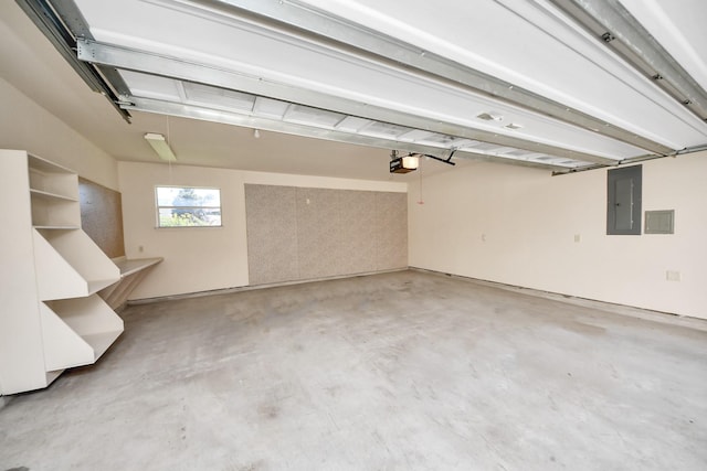 garage with electric panel and a garage door opener