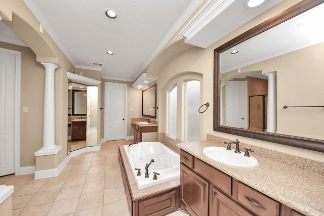 full bathroom with a sink, visible vents, a jetted tub, and ornate columns