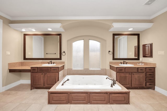 full bath featuring a sink, visible vents, ornamental molding, and a whirlpool tub