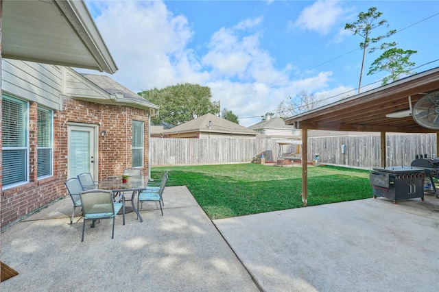 view of patio / terrace with a fenced backyard and outdoor dining space