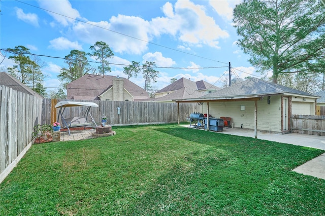 view of yard featuring a patio and a fenced backyard