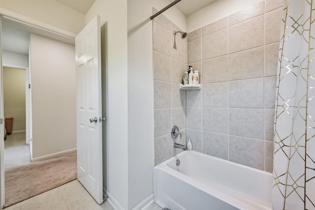 bathroom with tile patterned flooring, baseboards, and shower / bathtub combination with curtain