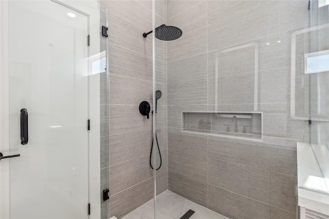 bathroom featuring a stall shower