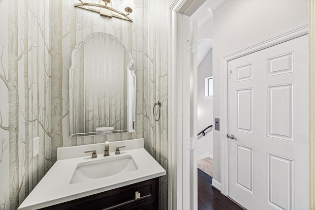 bathroom featuring vanity and wood finished floors