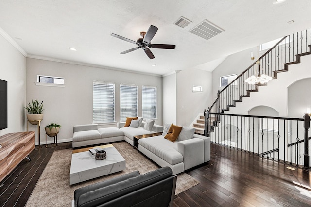 living area featuring visible vents, wood-type flooring, a healthy amount of sunlight, and ceiling fan