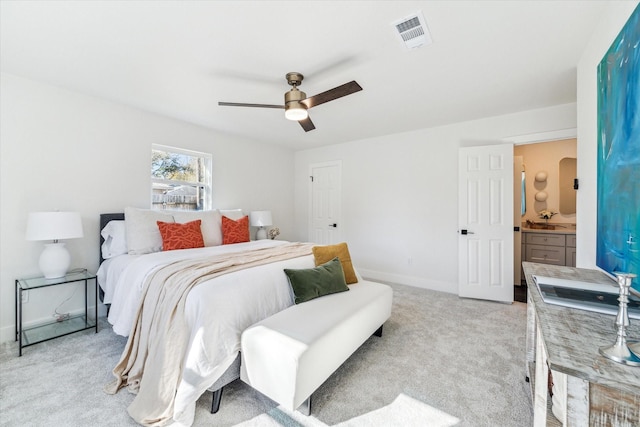 bedroom featuring a ceiling fan, light colored carpet, visible vents, and baseboards