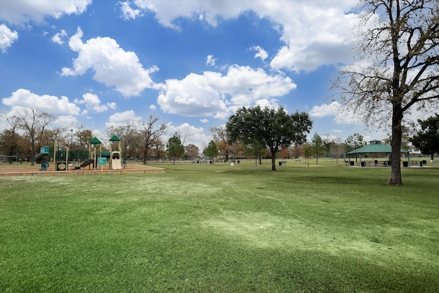 surrounding community with a gazebo, playground community, and a yard