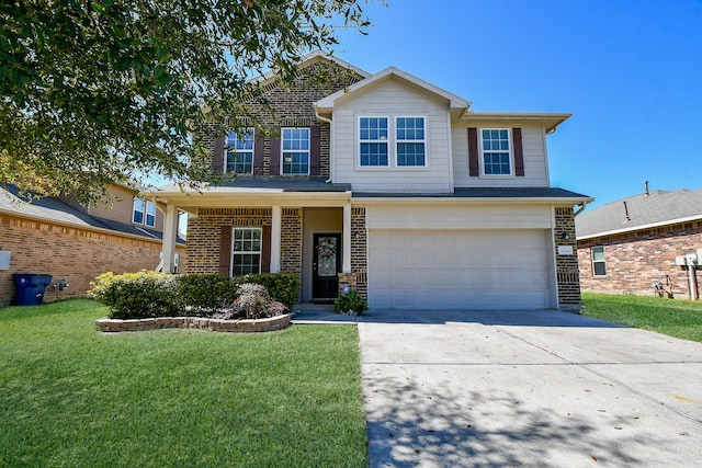 view of front facade with a front lawn, a garage, and driveway