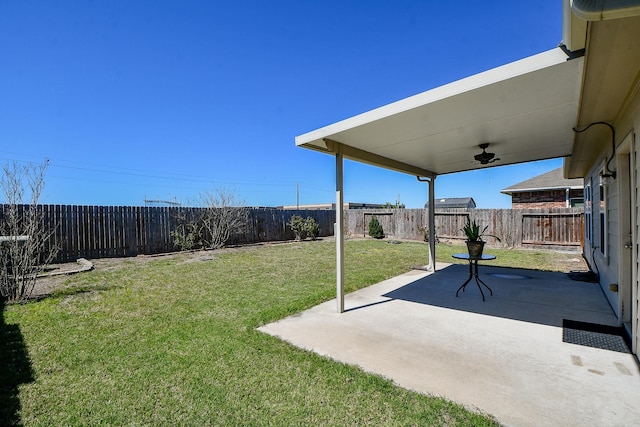 view of yard with a fenced backyard and a patio area