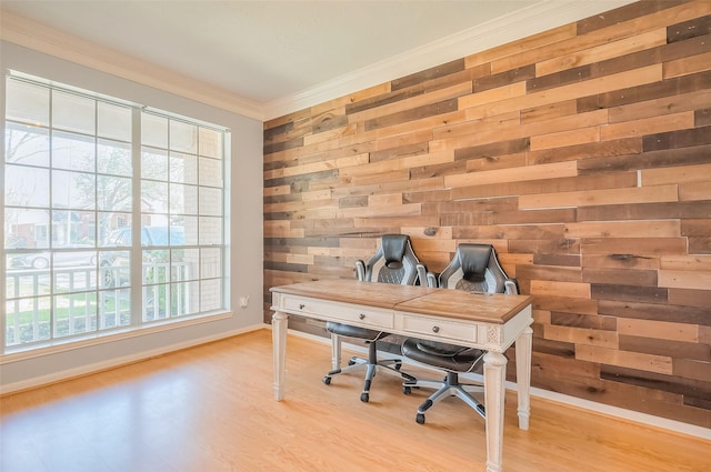 office with crown molding, wood finished floors, baseboards, and wood walls