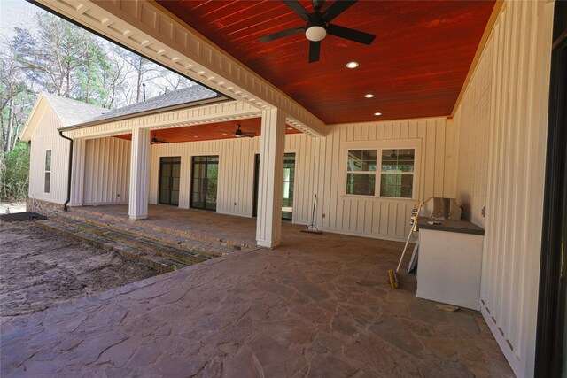 view of patio / terrace featuring ceiling fan