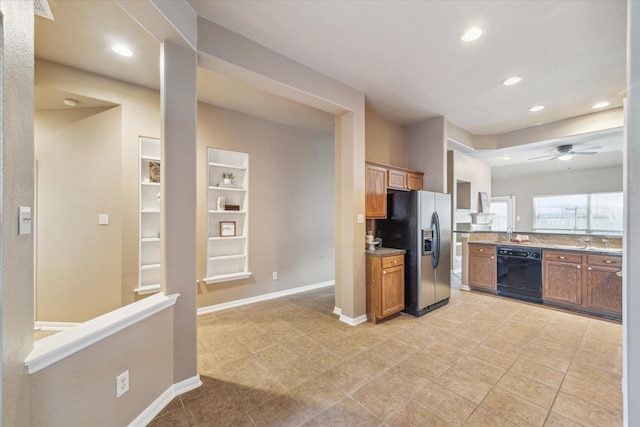 kitchen with black dishwasher, brown cabinetry, and stainless steel refrigerator with ice dispenser