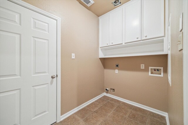 laundry area featuring electric dryer hookup, visible vents, cabinet space, baseboards, and hookup for a washing machine