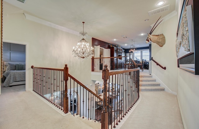 stairway with visible vents, baseboards, carpet flooring, recessed lighting, and an inviting chandelier