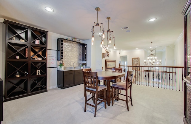 dining area with recessed lighting, visible vents, light carpet, and a notable chandelier