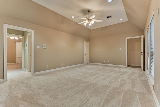 empty room featuring recessed lighting, light colored carpet, lofted ceiling, and a ceiling fan