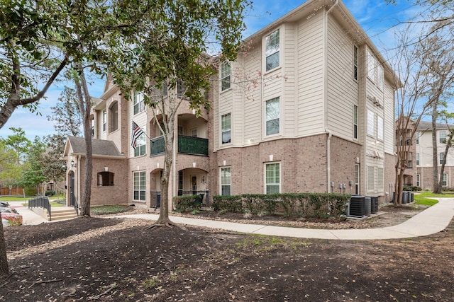 view of property with central AC unit