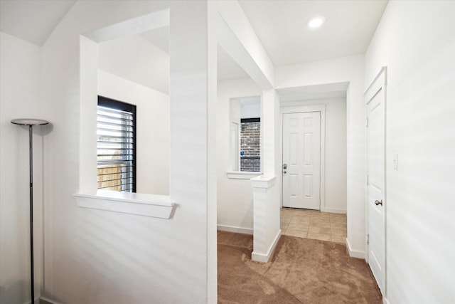 corridor with recessed lighting, baseboards, and carpet