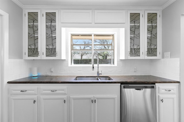 kitchen featuring white cabinetry, stainless steel dishwasher, glass insert cabinets, and a sink