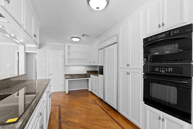 kitchen featuring black appliances, white cabinets, visible vents, and open shelves