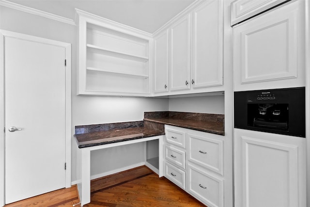 office area featuring dark wood finished floors and baseboards