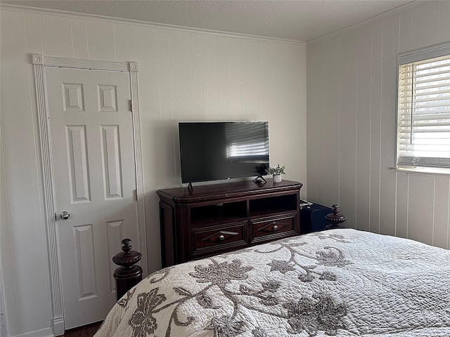 bedroom featuring ornamental molding