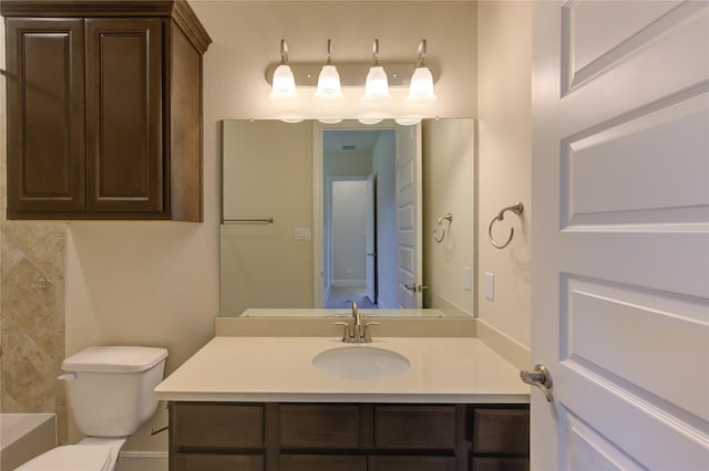 full bath with vanity and toilet