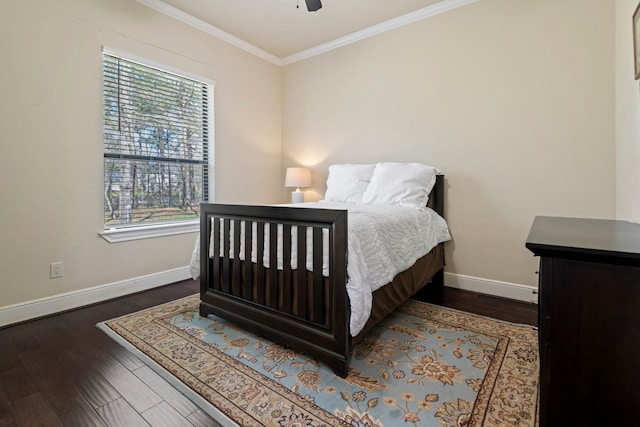 bedroom with ceiling fan, dark wood-type flooring, baseboards, and ornamental molding