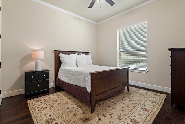 bedroom featuring hardwood / wood-style floors, a ceiling fan, baseboards, and ornamental molding