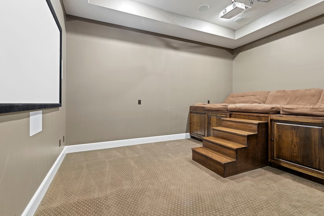 interior space featuring baseboards and light carpet