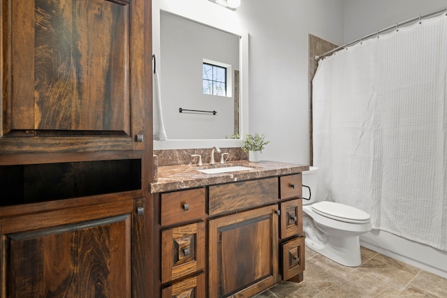 bathroom featuring shower / bath combo with shower curtain, toilet, and vanity