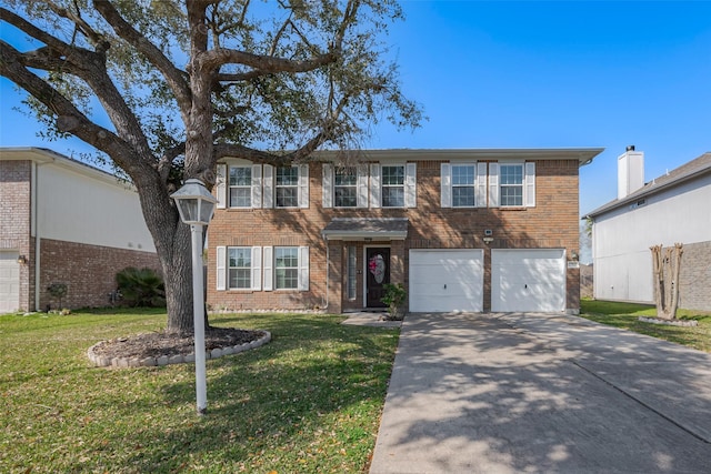 view of front of property featuring brick siding, a garage, driveway, and a front lawn