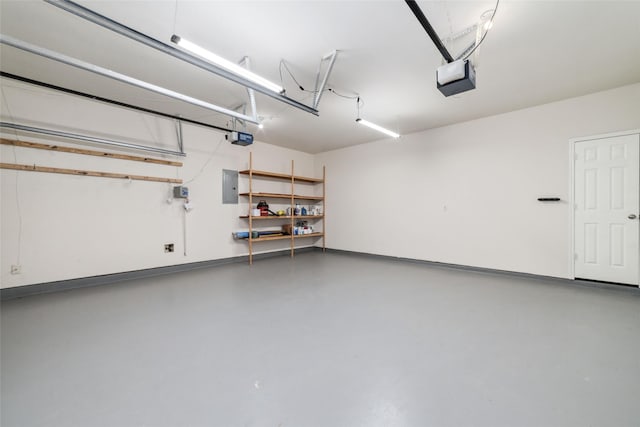 garage with electric panel, baseboards, and a garage door opener