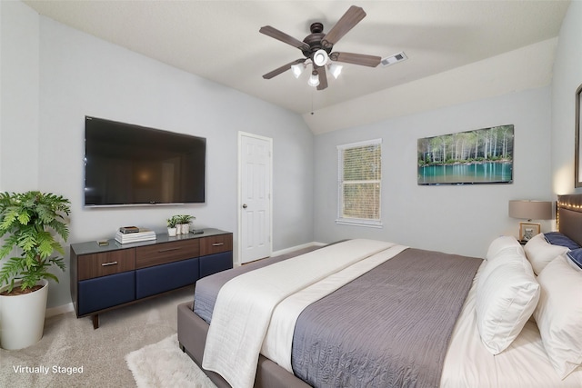 bedroom featuring a ceiling fan, baseboards, visible vents, lofted ceiling, and light carpet