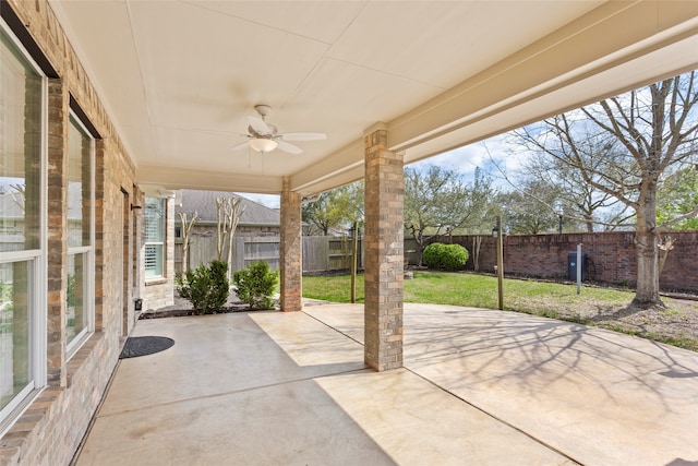 view of patio / terrace with a fenced backyard and a ceiling fan