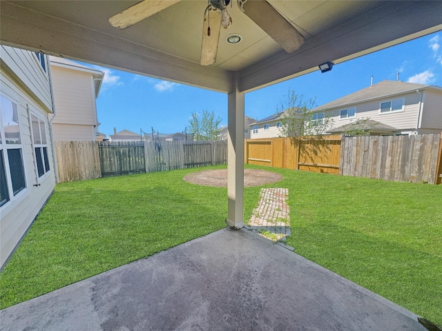 view of yard featuring a patio and a fenced backyard